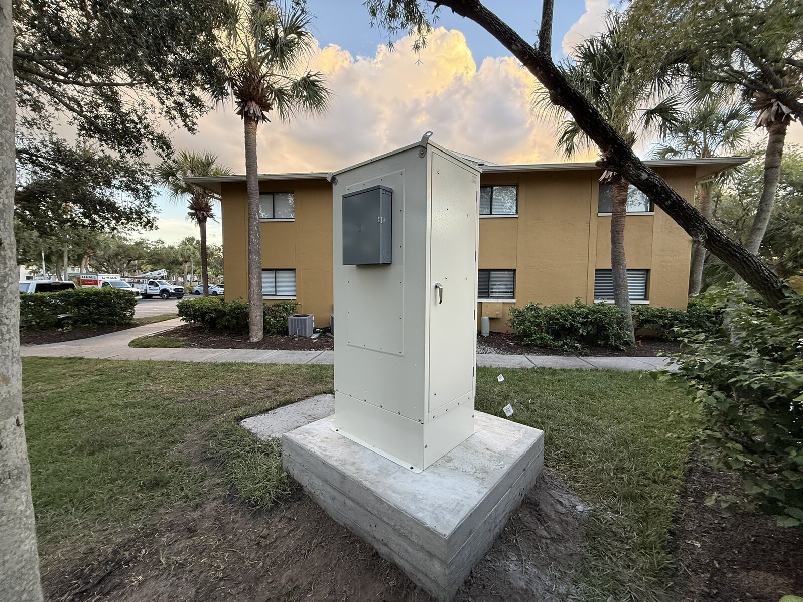 Exterior telecommunications cabinet positioned within a Tampa multifamily property
